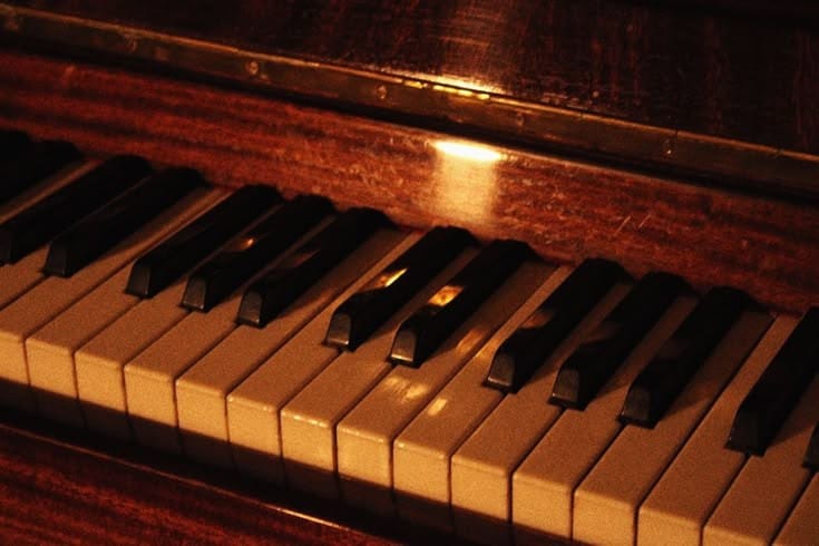 Piano notes linger in the Air..